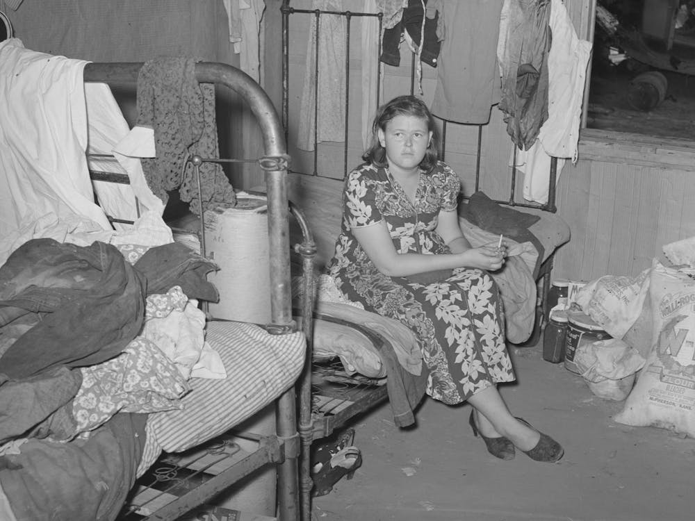 Member Of Migrant Family Group While They Were Camping Near Muskogee, Oklahoma Doing Day Labor To Obtain