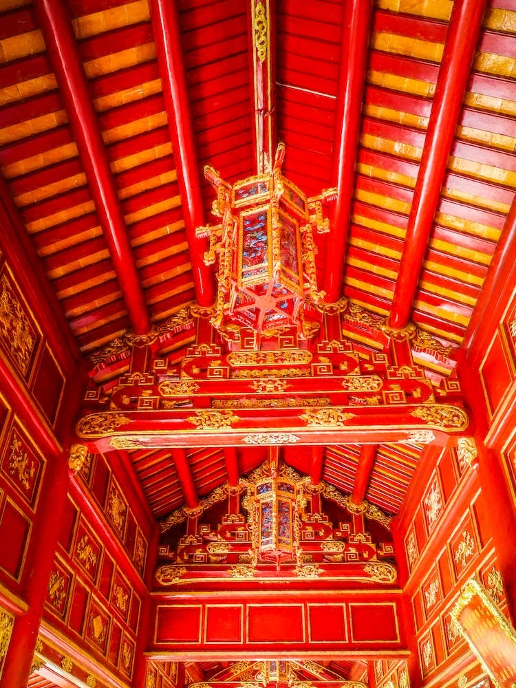 The Red And Gold Ceiling Of Hue Vietnam