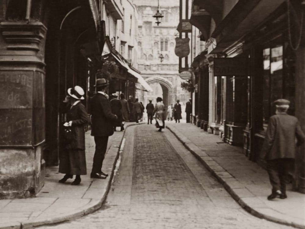 Old Photo Of A Narrow Street With People 3302247