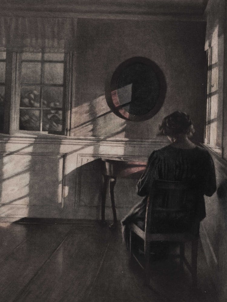 Woman In A Chair