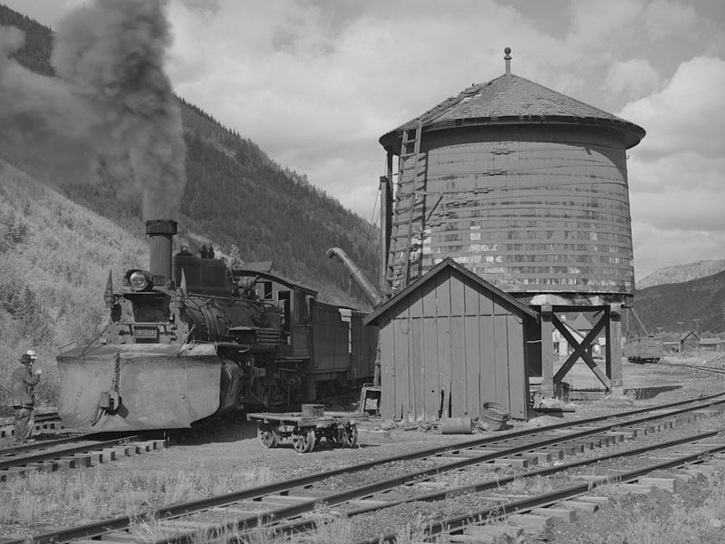 Untitled Photo, Possibly Related To Narrow Gauge Railway Yards, Train And Water Tank At Telluride, Colorado By