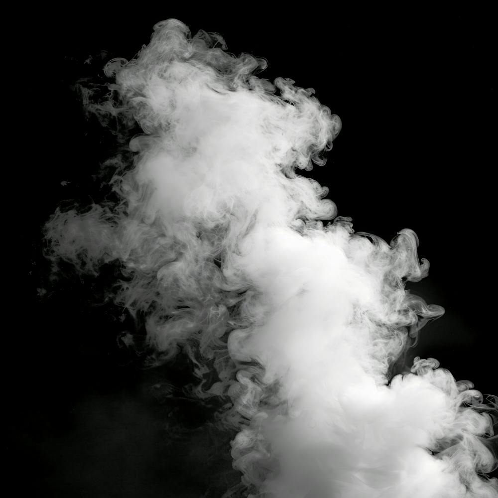 White Smoke On Black Background