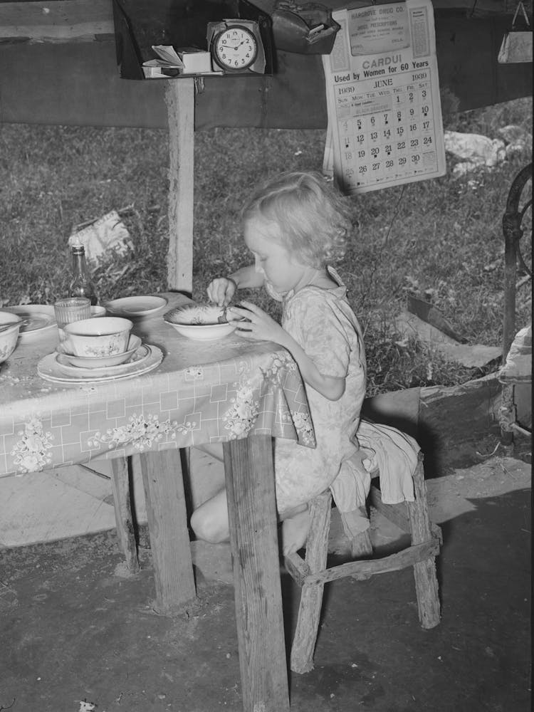 Daughter Of Day Laborer Eating Lunch In Tent Home Near Spiro, Oklahoma, Sequoyah County By Russell Lee