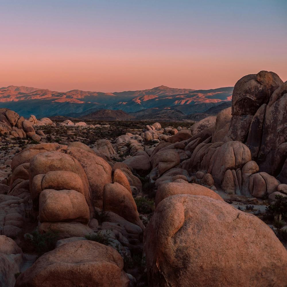 Pastel Sunset Over Boulders