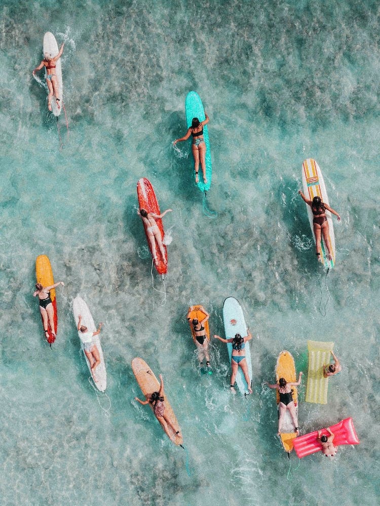 Aerial View Of People On Surfboards