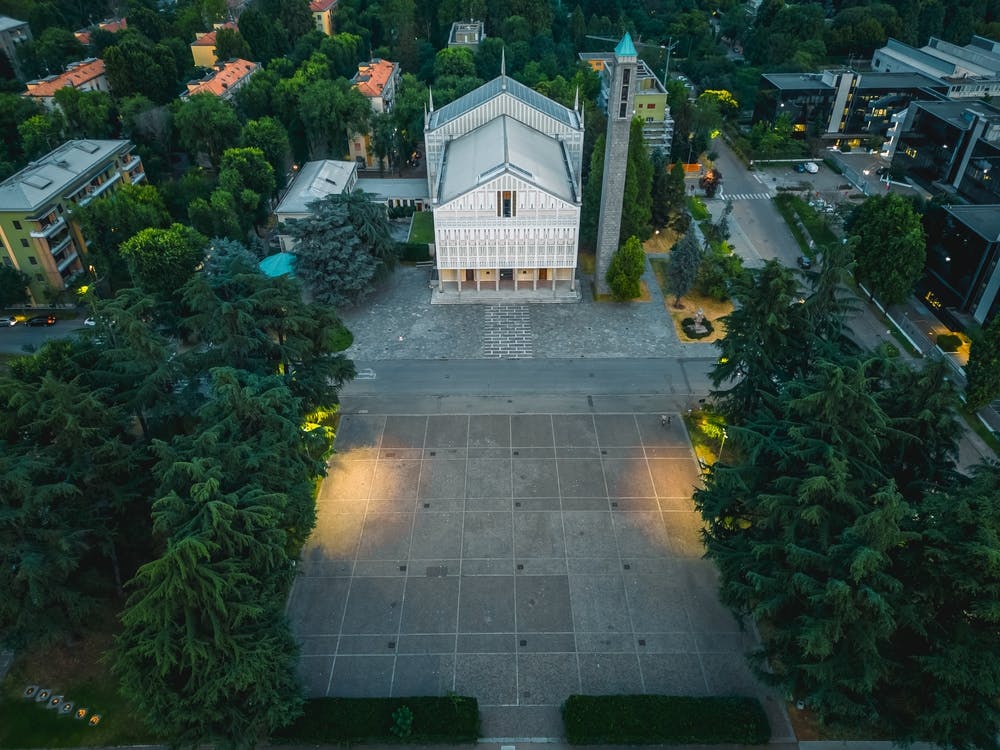 Above the Parish: Aerial Views of Santa Barbara, San Donato Milanese. Piazza Santa Barbara Wall