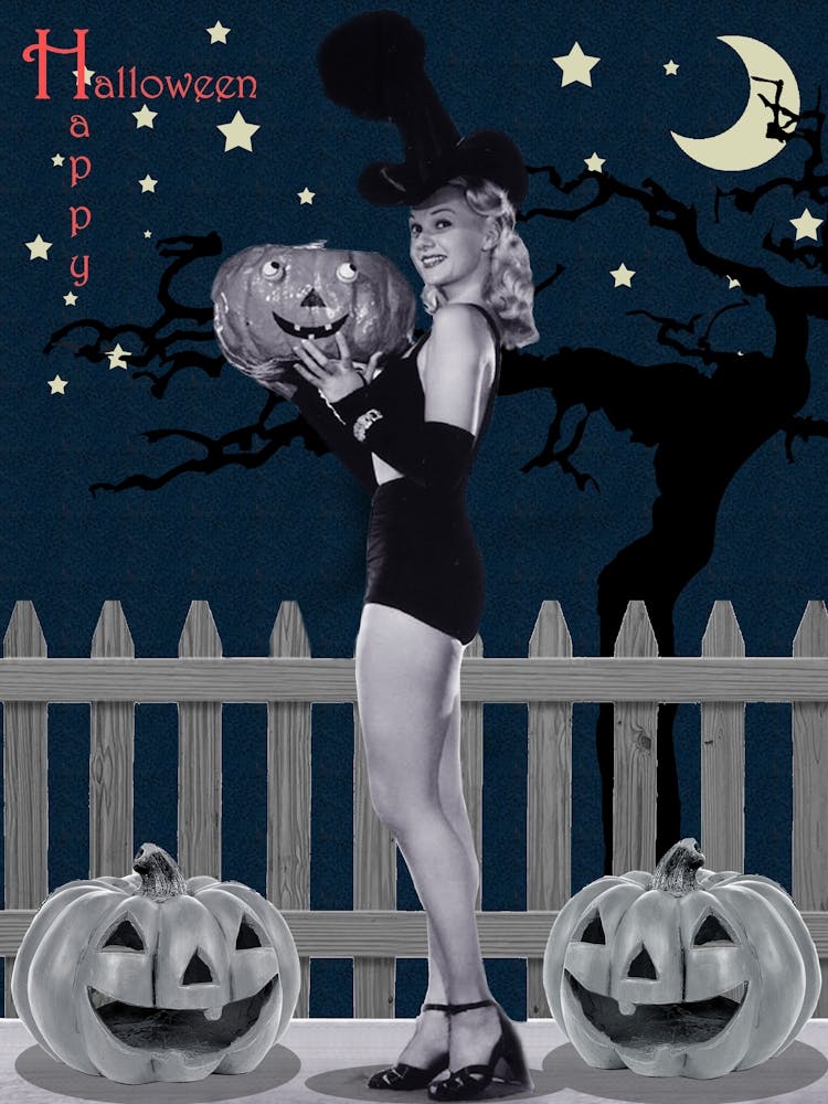 Pin Up Witch Is Posing With Pumpkin By The Fence